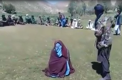 تصویر از طالبان یک دختر و پسر را در غور تیرباران کرد
